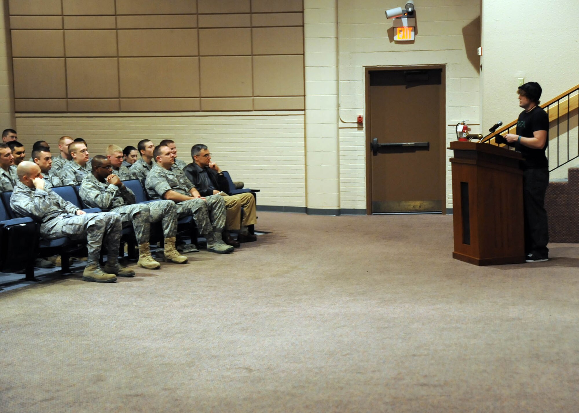 Jared Estes, survivor of a drunk-driving accident, talks to members of the 22nd Air Refueling Wing at the base theater, Feb. 18, 2011, McConnell Air Force Base, Kan.  Mr. Estes suffered severe burns on 50 percent of his body when a drunk driver struck his vehicle in Wichita. (U.S. Air Force photo/Staff Sgt. Dallas Edwards)