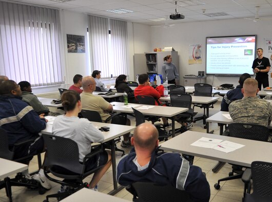 U.S. Air Force Retired Lt. Col. Gary Trautmann and his wife, Adrianna Mitchell, certified personal trainers, teach the Running for Dummies running clinic at the Health and Wellness Center, Ramstein Air Base, Germany, Feb. 23, 2011.  Running for Dummies is a class dedicated to helping people learn to run safely and properly. For more information contact the Ramstein HAWC. (U.S. Air Force photo by Senior Airman Caleb Pierce)