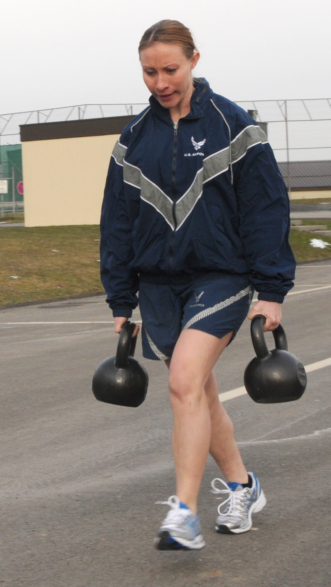 SPANGDAHLEM AIR BASE, Germany – Staff Sgt. Shannon Galvin, 52nd Communications Squadron, runs with weights during the Spangdahlem Air Base Iron Flight Competition at the Combat Fitness Center here Feb. 23. The competition consisted of six-person teams from squadrons across the base and consisted of a variety of individual and team challenges. The 52nd Communications Squadron won the competition out of the four teams that competed. (U.S. Air Force photo/Airman 1st Class Matthew B. Fredericks)