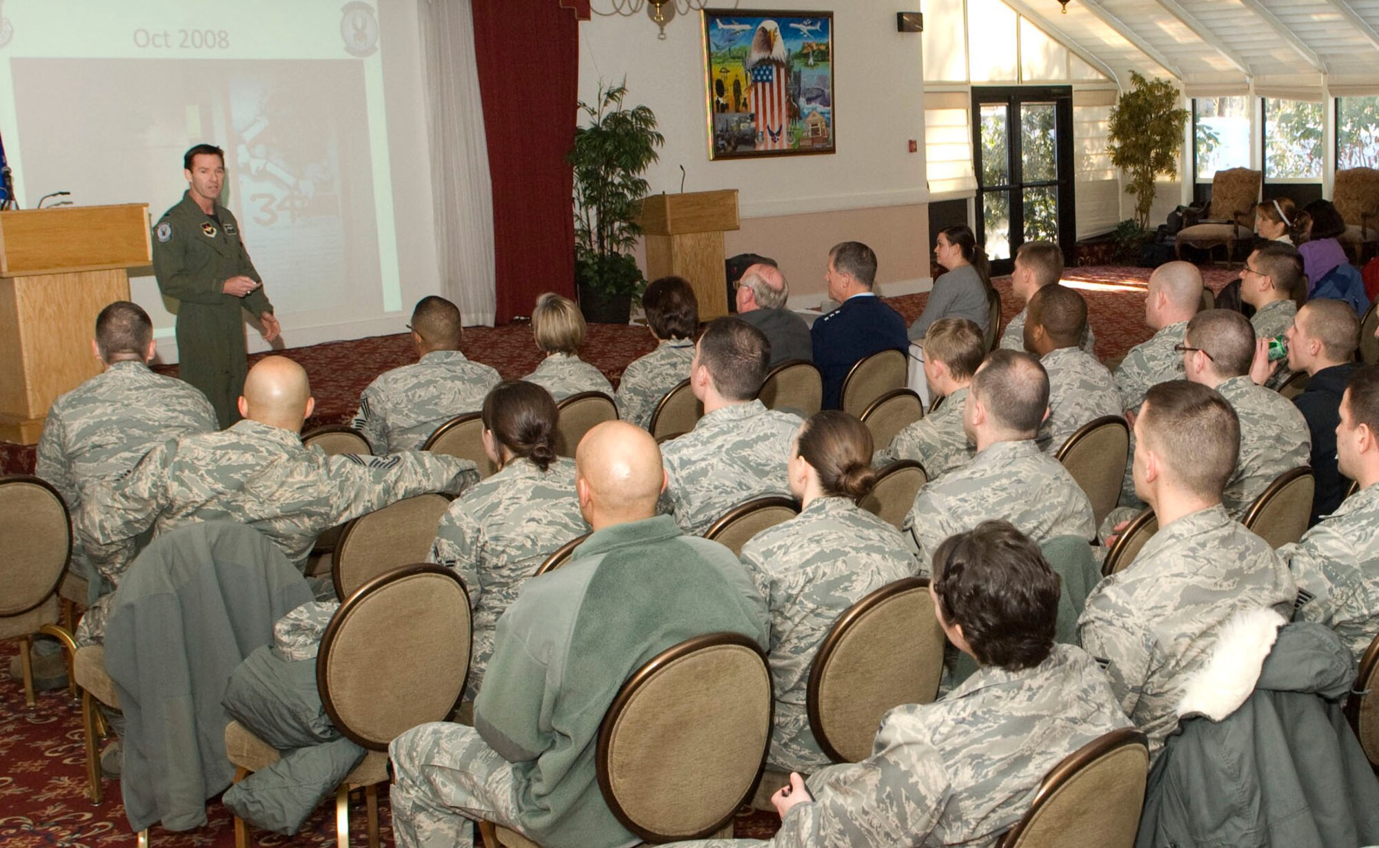 HANSCOM AIR FORCE BASE, Mass. – Lt. Col. Timothy “Goose” Gosnell, commander of the 421st Fighter Squadron during their historic Bagram deployment, speaks to a packed ballroom at the Minuteman Club on Feb. 22. As part of the Heritage of Freedom event, Colonel Gosnell and Lt. Col. Chris Echols, 66th Security Forces Squadron commander, spoke about harrowing events in Afghanistan last year where Airmen showed courage under duress. (U.S. Air Force photo by Mark Herlihy)