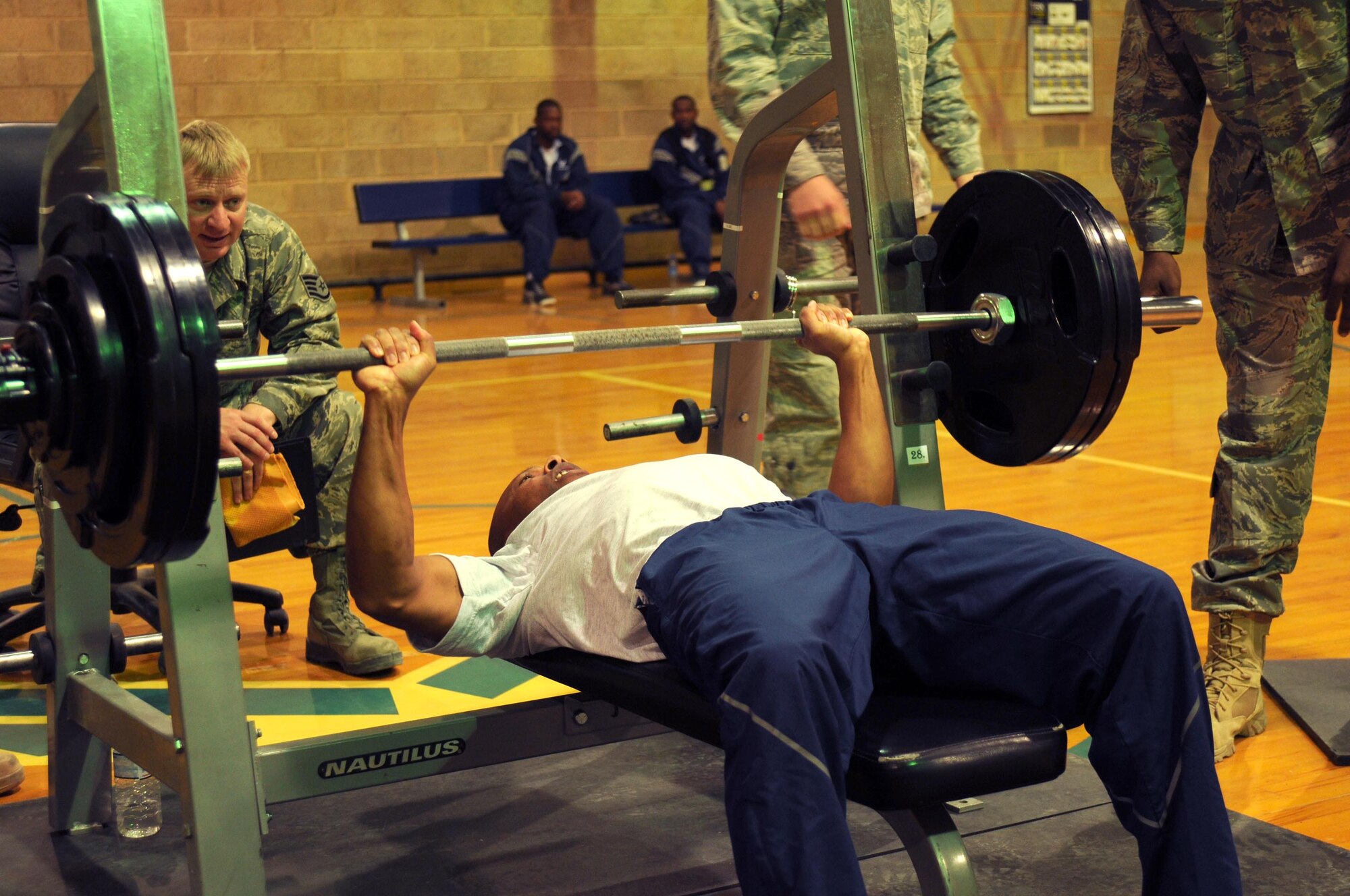 Staff Sgt. Bobby Harrison, 386th Expeditionary Logistics Readiness Squadron, pushes up one of his attempts during the Bench Press Competition here Feb. 12. Sergeant Harrison took first place in the mens 30-39 category with 290 points. (U.S. Air Force Photo by Staff Sgt. Patrice Clarke)