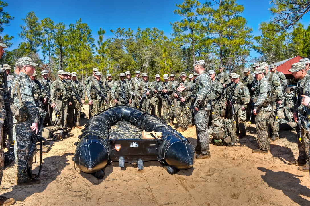 A U.S. Army instructor briefs Ranger students on small boat movement during the swamp training phase at Camp Rudder on Eglin Air Force Base, Fla., Feb. 15, 2011.