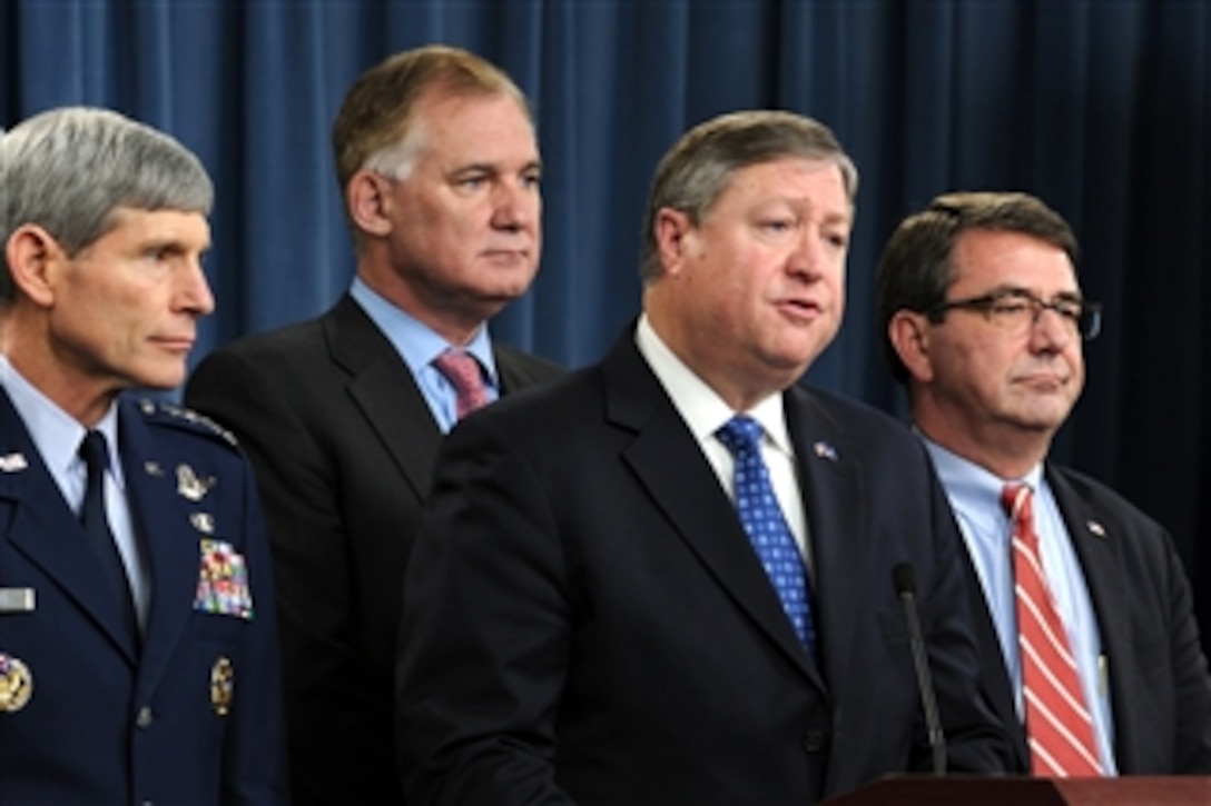 Air Force Chief of Staff Gen. Norton A. Schwartz (left), Deputy Secretary of Defense William J. Lynn III, Secretary of the Air Force Michael B. Donley and Under Secretary of Defense for Acquisition, Technology & Logistics Ashton B. Carter (right) speak with members of the press about the KC-X contract announcement in the Pentagon on Feb. 24, 2011.  