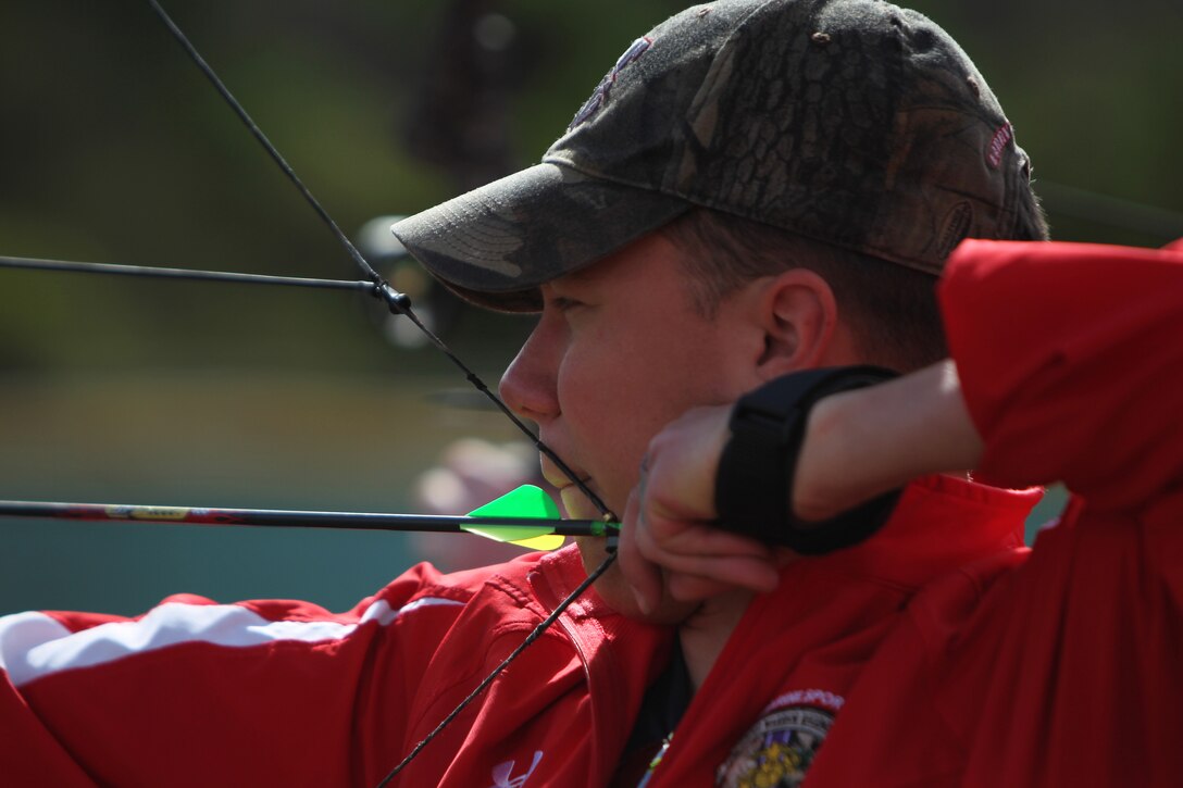 Lance Cpl. James Grove, a patient with the Combat Center’s Wounded Warrior Detachment, zeros in on his target during the archery portion of the Inaugural Marine Corps Trials, hosted at Marine Corps Base Camp Pendleton, Calif., Feb. 25, 2011. Grove is from Sellersville, Penn.