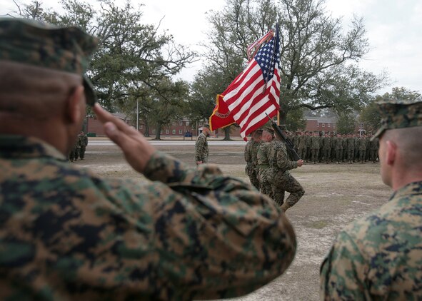 Sgt. Maj. Phillip A. Orellano (left), the new sergeant major for Combat Logistics Battalion 6, 2nd Marine Logistics Group, renders honors following a post and relief ceremony aboard Camp Lejeune, N.C., Feb. 25. Orellano joins the battalion from 2nd Battalion, 6th Marine Regiment. (U.S. Marine Corps photo by Sgt. Justin J. Shemanski)::r::::n::