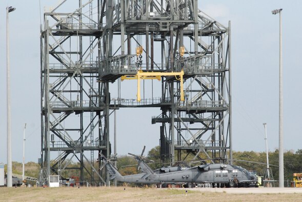 KENNEDY SPACE CENTER, Fla.  - Airmen from the 920th Rescue Wing out of nearby Patrick Air Force base, sit on alert with their fleet of HH-60G Pave Hawk helicopters at the shuttle landing facility here in preparation for Space Shuttle Discovery's last lift off. The Reserve Airmen provide NASA space shuttle support operations. Air Force Reservists are responsible for rescuing the astronauts if they were to bail out of the shuttle into the Ocean due to an emergency situation. (U.S. Air Force photo/Capt. Matthew C. Simpson)