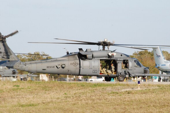 KENNEDY SPACE CENTER, Fla.  - Airmen from the 920th Rescue Wing out of nearby Patrick Air Force base, land this HH-60G Pave Hawk helicopter at the shuttle landing facility here in preparation for Space Shuttle Discovery's last lift off. The Reserve Airmen provide NASA space shuttle support operations. Not only are the reservists on alert during lift off charged with rescuing the astronauts, but remain on alert until the shuttle returns safely with the astronauts on board. (U.S. Air Force photo/Capt. Matthew C. Simpson)