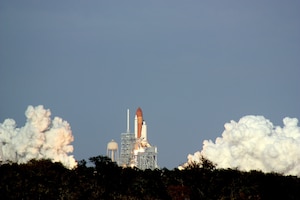 KENNEDY SPACE CENTER, Fla. -- Space shuttle Discovery lifts off for the last time from Launch Pad 39A at 4:53 p.m. Thursday, Feb. 24, 2011. "This is a historic flight, with one of the last Air Force shuttle crews," said Brig. Gen. Ed Wilson, 45th Space Wing commander, Launch Decision Authority for STS-133. "The 45th Space Wing is pleased to have participated with NASA and our mission partners on a safe, successful launch. Congratulations to the team for another successful mission supporting our nation's human space program." (U.S. Air Force photo/Brad Swezey)