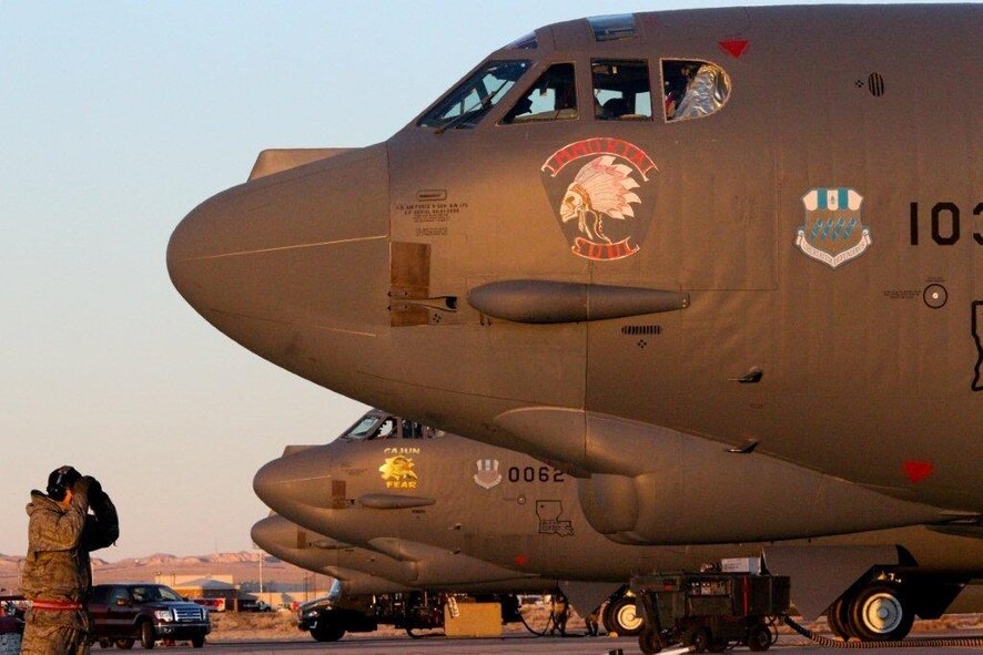 Three B-52s from the 96th Bomb Squadron at Barksdale Air Force Base, La., line up on the flightline at Nellis AFB, Nev. The B-52s participated in Exercise Red Flag, which is traditionally one of the Air Force’s most comprehensive training events preparing aviators for war. (courtesy photo) 