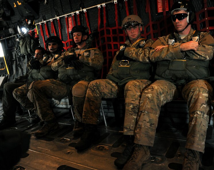 VALDOSTA, Ga. -- Members of the 347th Rescue Group and 820th Base Defense Group wait to static line jump inside an HC-130P Combat King aircraft Feb. 24. A total of 12 jumpers participated in the training. (U.S. Air Force photo/Airman 1st Class Benjamin Wiseman)(RELEASED)