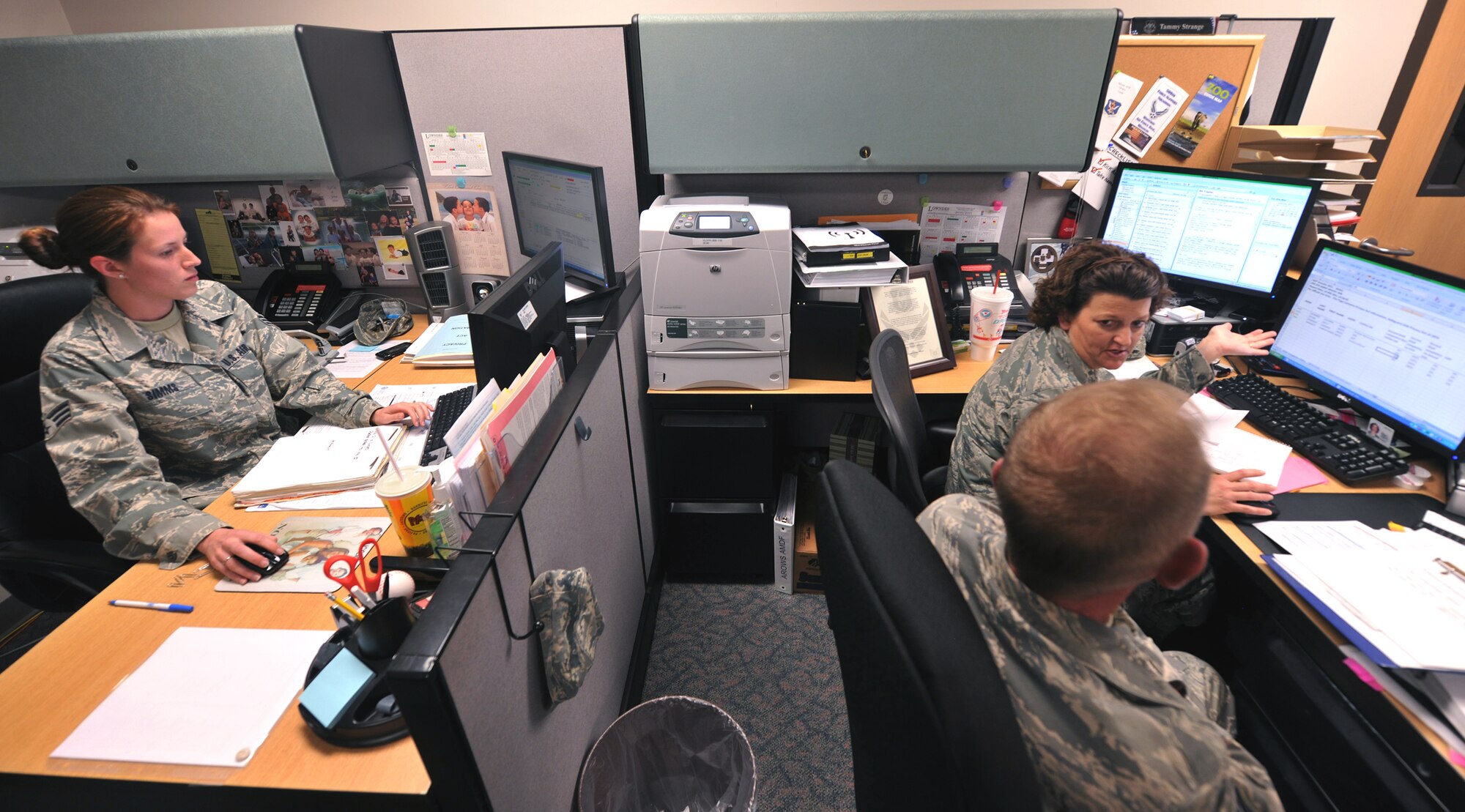 MOODY AIR FORCE BASE, Ga.-- Airmen from the 476th Aerospace Medicine Flight, work on medical records Feb 23. Reservists are now being integrated into the active duty work force and becoming more than a "Citizen Airman" as they work alongside active-duty members at the 23rd Wing on a daily basis. (U.S. Air Force photo/Airman 1st Class Joshua Green)(RELEASED)
