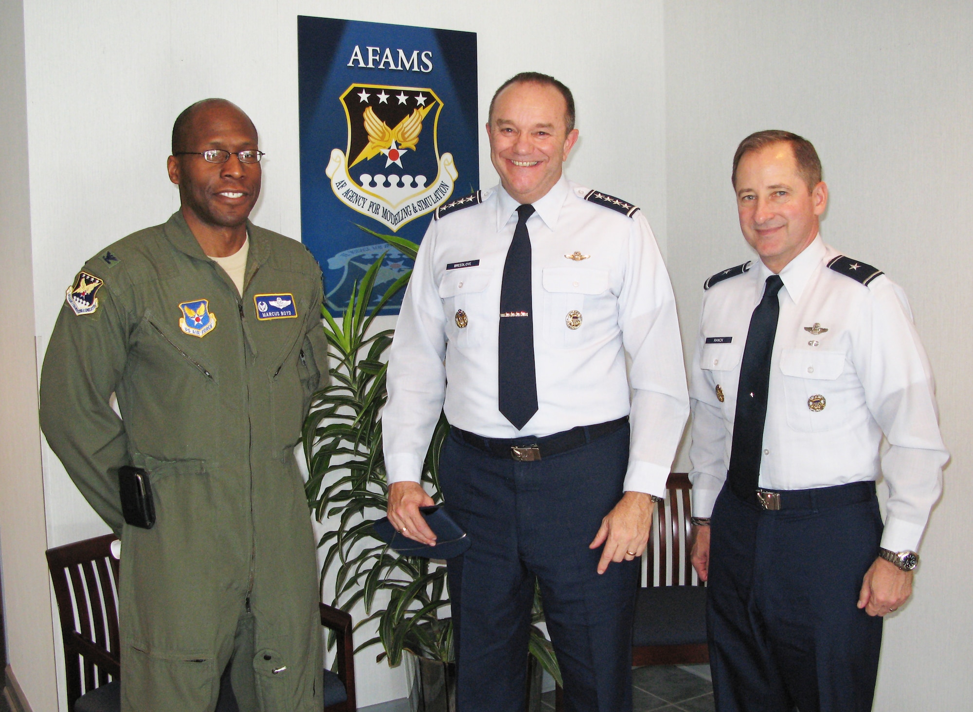 Air Force Agency for Modeling and Simulation Commander Col. Marcus Boyd (from left) welcomed Gen. Philip Breedlove and Brig. Gen. John R. “Bob” Ranck Jr. to the AFAMS office in Orlando, Fla., on Feb. 18.  General Breedlove is vice chief of staff of the Air Force, and General Ranck is director of Warfighter Systems Integration in the Office of Information Dominance and chief information officer in the Office of the Secretary of the Air Force.  Both generals are stationed at the Pentagon.  (U.S. Air Force photo/Jim Stachowicz)