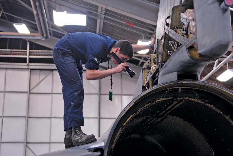 Airman 1st Class Jacob Gonzalez, 56th Equipment Maintenance Squadron phase team member, inspects an aircraft using work cards during a phase inspection at phase dock three on February 17th.  Phase dock members fill out work cards to ensure the jet is fixed correctly.  (U.S. Air Force photo/Aiman David Owsianka)