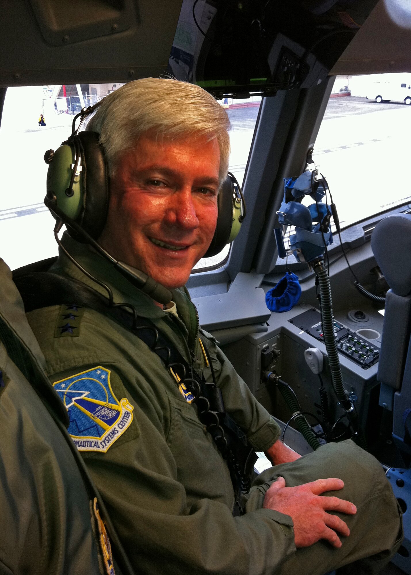 Lt. Gen. Thomas Owen, commander Air Force Aeronautical Systems Center, rides on the flight deck of Joint Base Charleston's newest C-17 to be delivered Feb. 25, 2011 from the Boeing plant in California.  (U.S. Air Force Photo/Lt. Col. Bill Walsh) 
