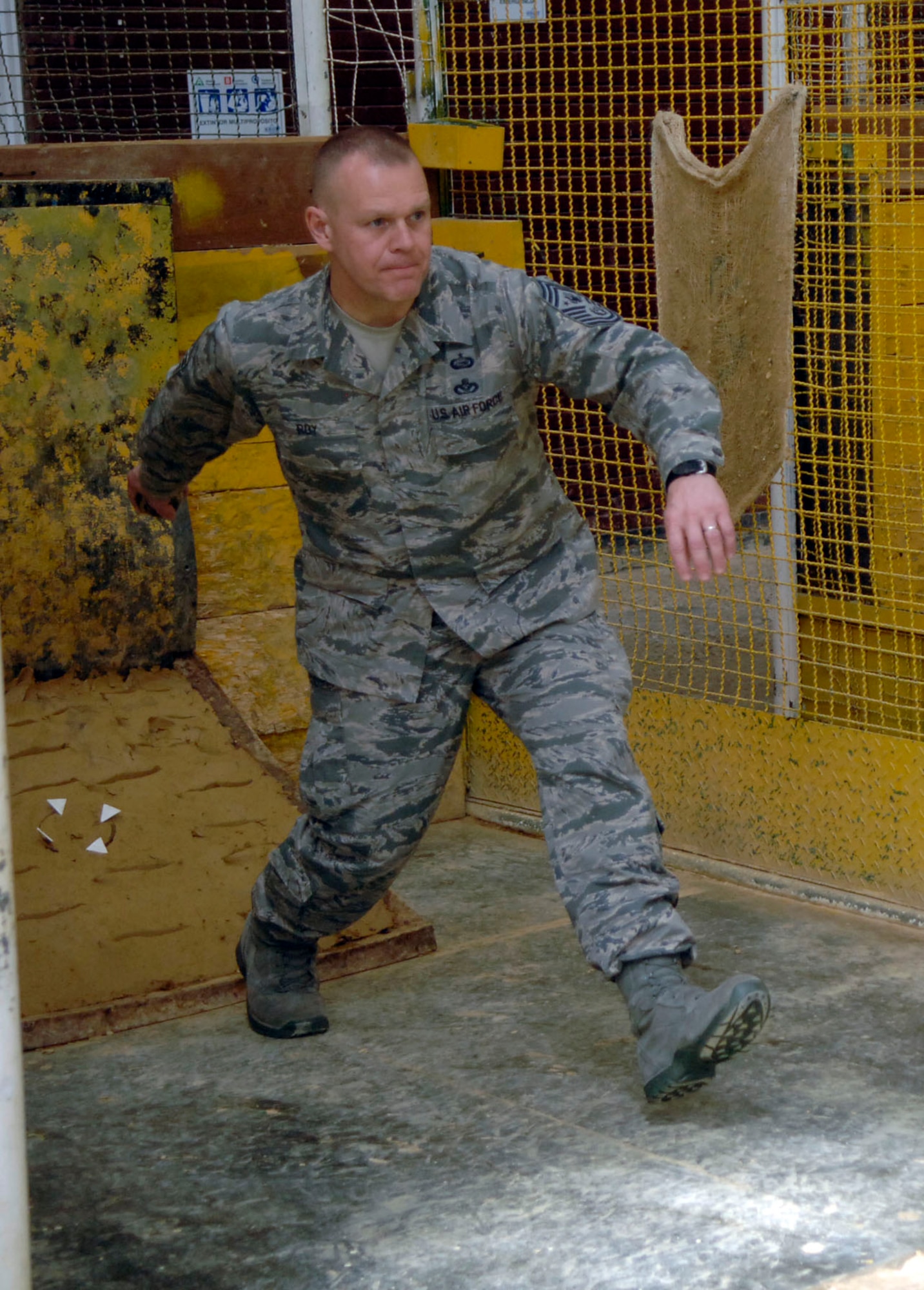 BOGOTA, Colombia -- Chief Master Sgt. of the Air Force James Roy competes in a game of "Tejo" Feb. 2 during a trip to the International NCO Academy. The friendly challenge was issued by students of the INCOA as a cultural experience.  Chief Roy's visit focused on strengthening relationships between U.S. and Columbian Airmen. (U.S. Air Force photo/Tech. Sgt. Eric Petosky)