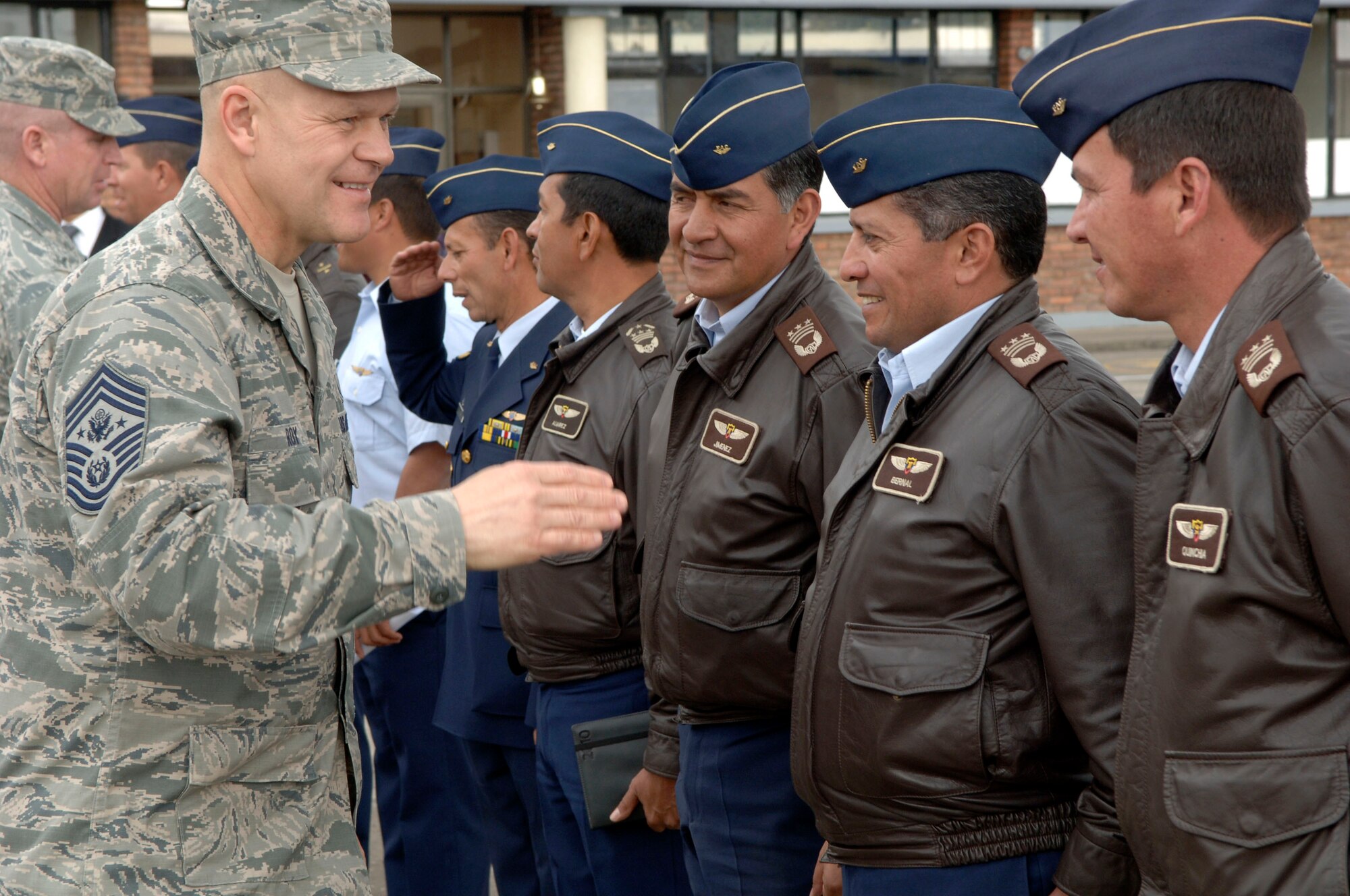BOGOTA, Colombia -- Chief Master Sgt. of the Air Force James Roy greets Colombian Air Force staff at the Escuela de Suboficiales Feb. 1. The Escuela de Suboficiales is a three-year NCO academy which grants undergraduate degrees in military specialties to more than 100 students a year. Chief Roy's visit focused on strengthening relationships between U.S. and Columbian Airmen. (U.S. Air Force photo/Tech. Sgt. Eric Petosky)