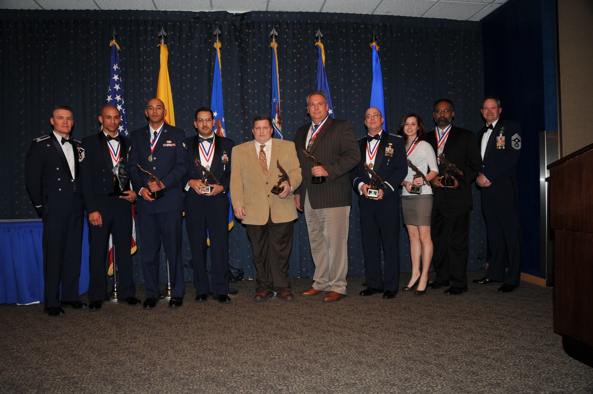498th Nuclear Systems Wing annual award winners with Col. Walter Lindsley, 498th Nuclear Systems Wing commander and Master Sgt. William Moore, 498th NSW First Sergeant of the Year, Senior Airman Andrew Curtis, 498th Airman of the Year, Master Sgt. Anthony Khan, 498th NSW Senior NCO of the Year, John Fisher, 498th NSW Civilian of the Year Category IV, Myron Boone, 498th NSW Civilian of the Year Category II, Capt. Claus Fasting, 498th NSW Company Grade Officer of the Year, Leighanna Martinez, 498th NSW Civilian of the Year Category I, Terry Turner, 498th NSW Civilian of the Year Category III, Chief Master Sgt. Lee Thompson, 498th NSW command chief.  U.S. Air Force Photo by Todd Berenger