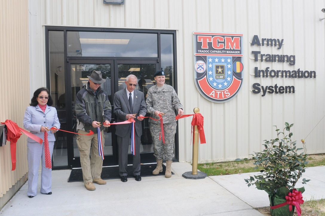 (From left) Hue Mai, 733d Civil Engineer Division project manager, Kenny Bone, senior project manager, Larry Matthews, U.S. Army Training and Doctrine Command Capability Manager-Army Training Information Center director, and Col. Sharon Baker, Army Training Support Center commander, cut the ribbon during the grand opening Tuesday of the TCM-ATIS’ new annex at Bldg. 3308, Wilson Ave., Fort Eustis. (Photo by Lyna Tucker)


