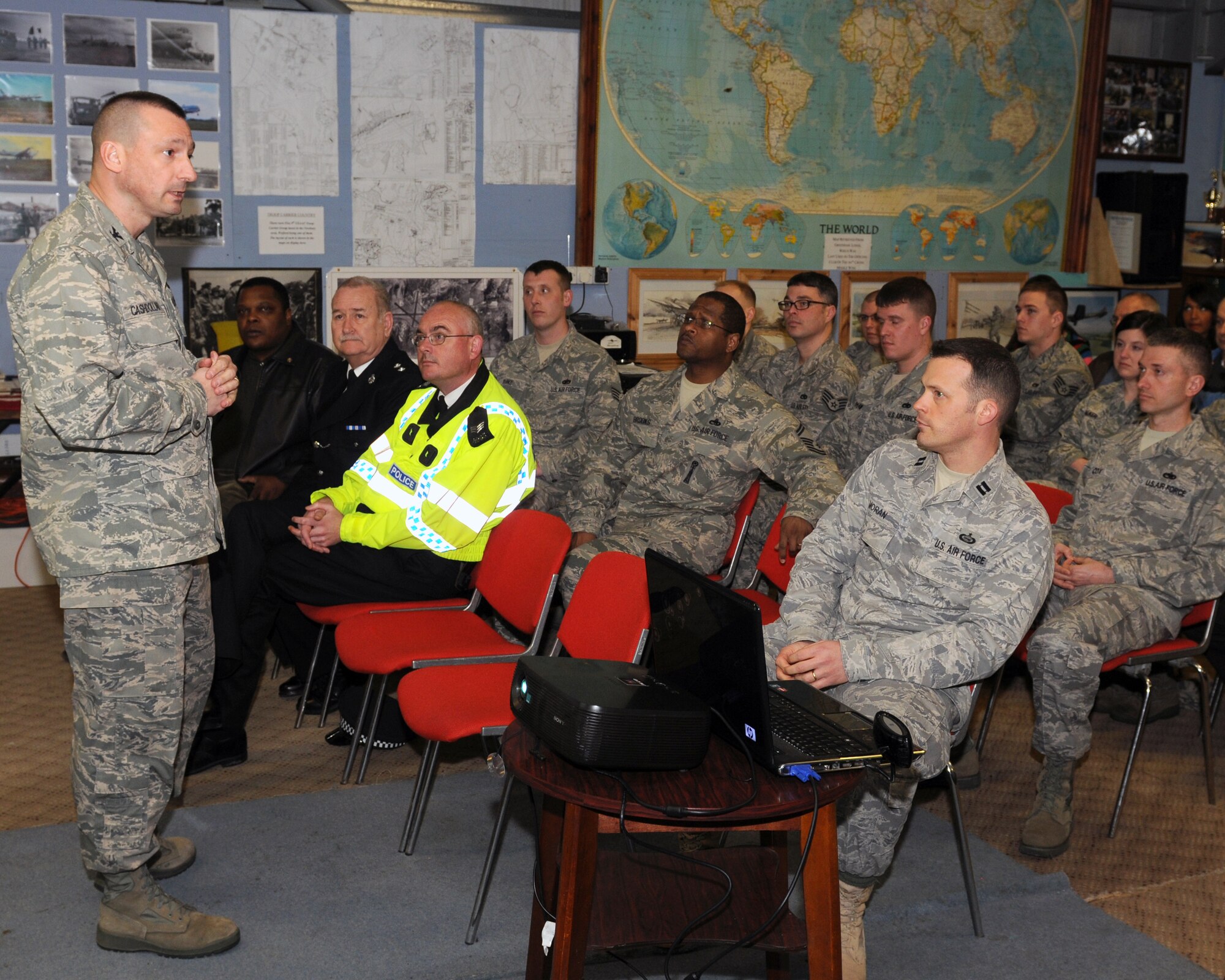 RAF WELFORD, United Kingdom - Col. Timothy Cashdollar gives his last quarterly commander's call Feb. 24 to Airmen and MoD personnel at RAF Welford. Topics of the call were safety, operational security, IG concerns, inspection results for the wing, USAFE metrics, and a chance for Colonel Cashdollar to say thanks a final time to the wing. Colonel Cashdollar is the 501st Combat Support Wing commander. (U.S. Air Force photo by Tech. Sgt. John Barton)