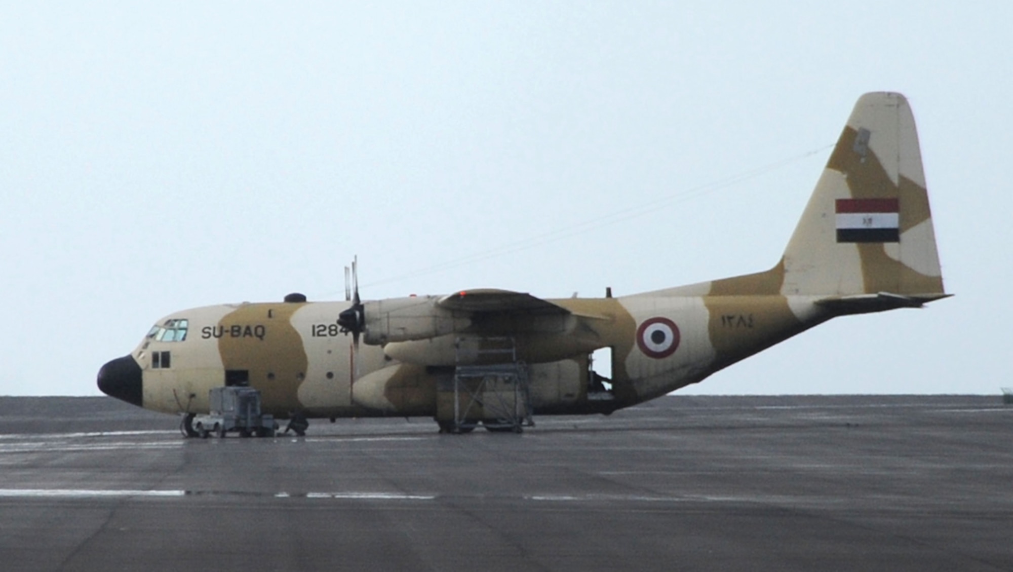 An Egyptian C-130 Hercules en-route during a mission, lands on Feb. 20 at Lajes Field, Azores. The aircraft received fuel and aircraft support from U.S. Air Force and Portuguese Air Force members.  (Photo by Tech. Sgt. Chyrece Campbell)