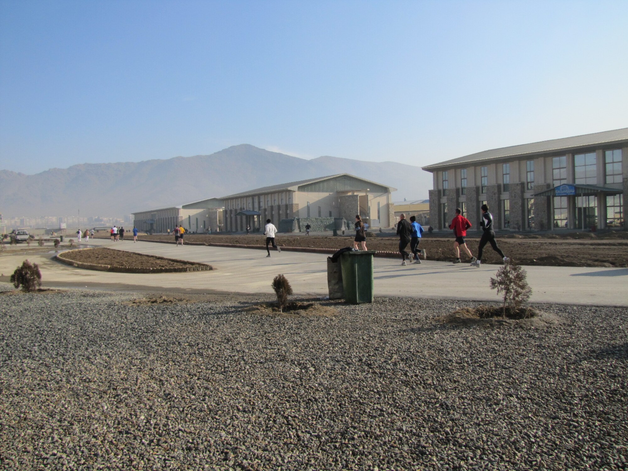 KABUL, Afghanistan - Members of the NATO Air Training Command - Afghanistan and ISAF Joint Command run the annual Fort Worth Cowtown race, one of the largest multi-event road races in the United States, at the Kabul International Airport, Afghanistan Feb 25. (U.S. Air Force photo by Capt. Rob Leese).