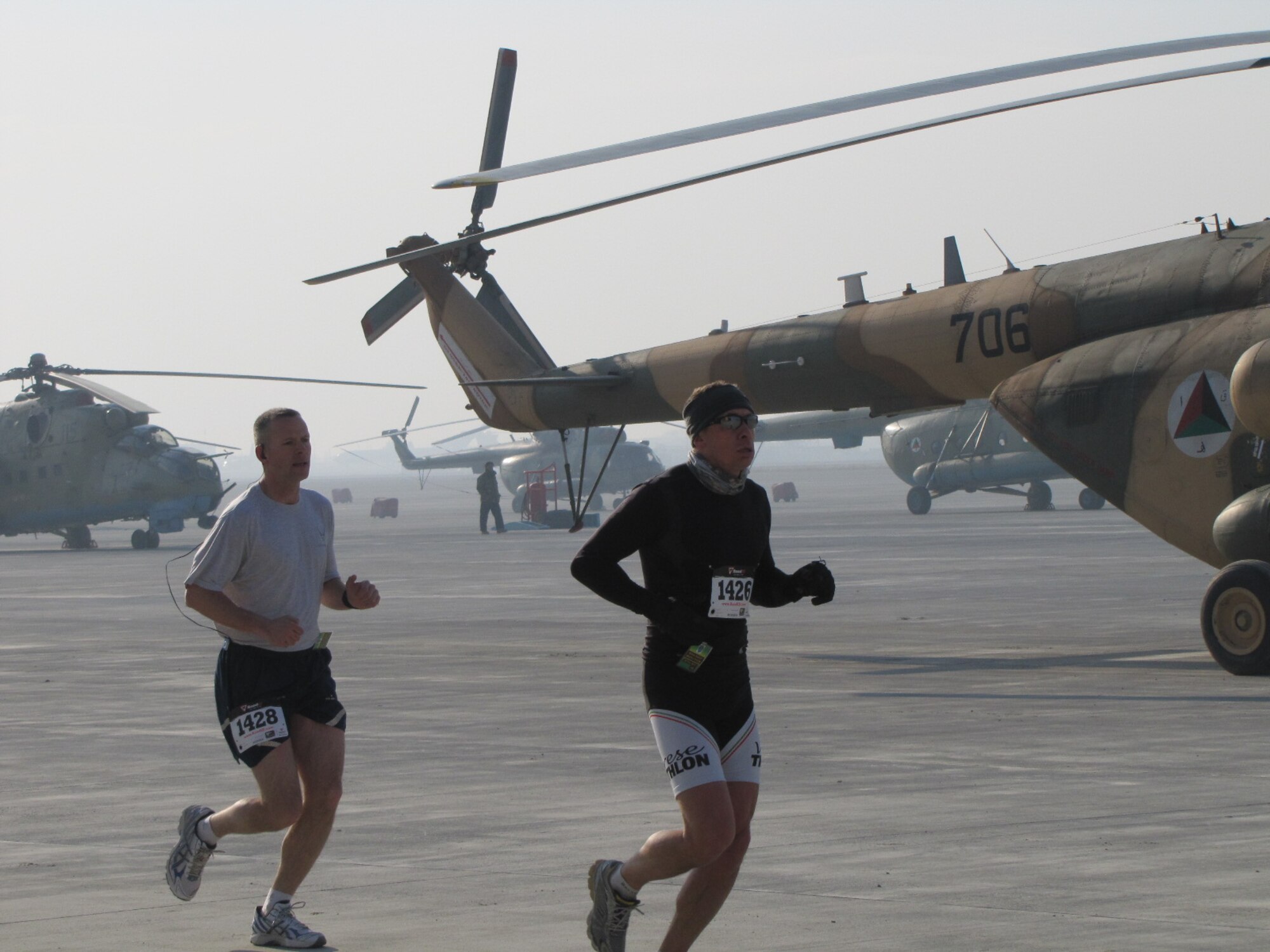 KABUL, Afghanistan - Members of the NATO Air Training Command - Afghanistan and ISAF Joint Command run the annual Fort Worth Cowtown race, one of the largest multi-event road races in the United States, at the Kabul International Airport, Afghanistan Feb 25. (U.S. Air Force photo by Capt. Rob Leese).