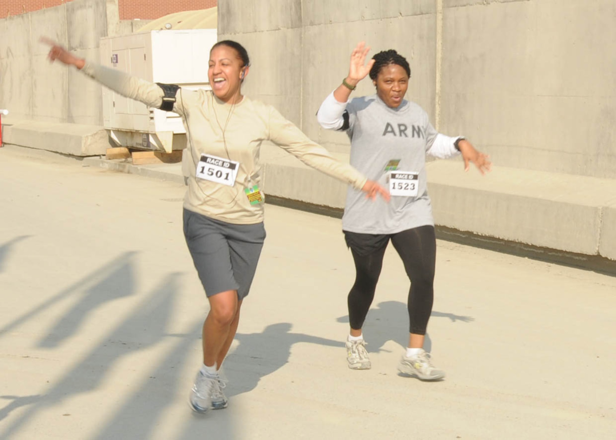 KABUL, Afghanistan - Members of the NATO Air Training Command - Afghanistan and ISAF Joint Command run the annual Fort Worth Cowtown race, one of the largest multi-event road races in the United States, at the Kabul International Airport, Afghanistan Feb 25. (U.S. Navy photo by Mass Communications Specialist 3rd Class Jared E. Walker).