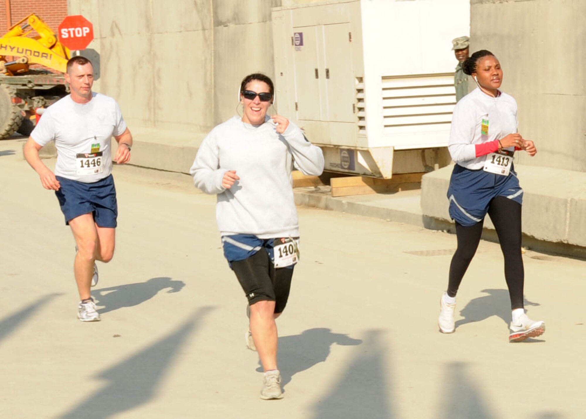 KABUL, Afghanistan - Members of the NATO Air Training Command - Afghanistan and ISAF Joint Command run the annual Fort Worth Cowtown race, one of the largest multi-event road races in the United States, at the Kabul International Airport, Afghanistan Feb 25. (U.S. Navy photo by Mass Communications Specialist 3rd Class Jared E. Walker).