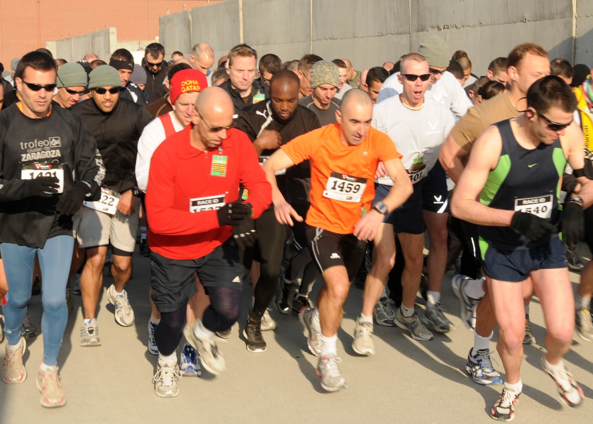 KABUL, Afghanistan - Members of the NATO Air Training Command - Afghanistan and ISAF Joint Command run the annual Fort Worth Cowtown race, one of the largest multi-event road races in the United States, at the Kabul International Airport, Afghanistan Feb 25. (U.S. Navy photo by Mass Communications Specialist 3rd Class Jared E. Walker).