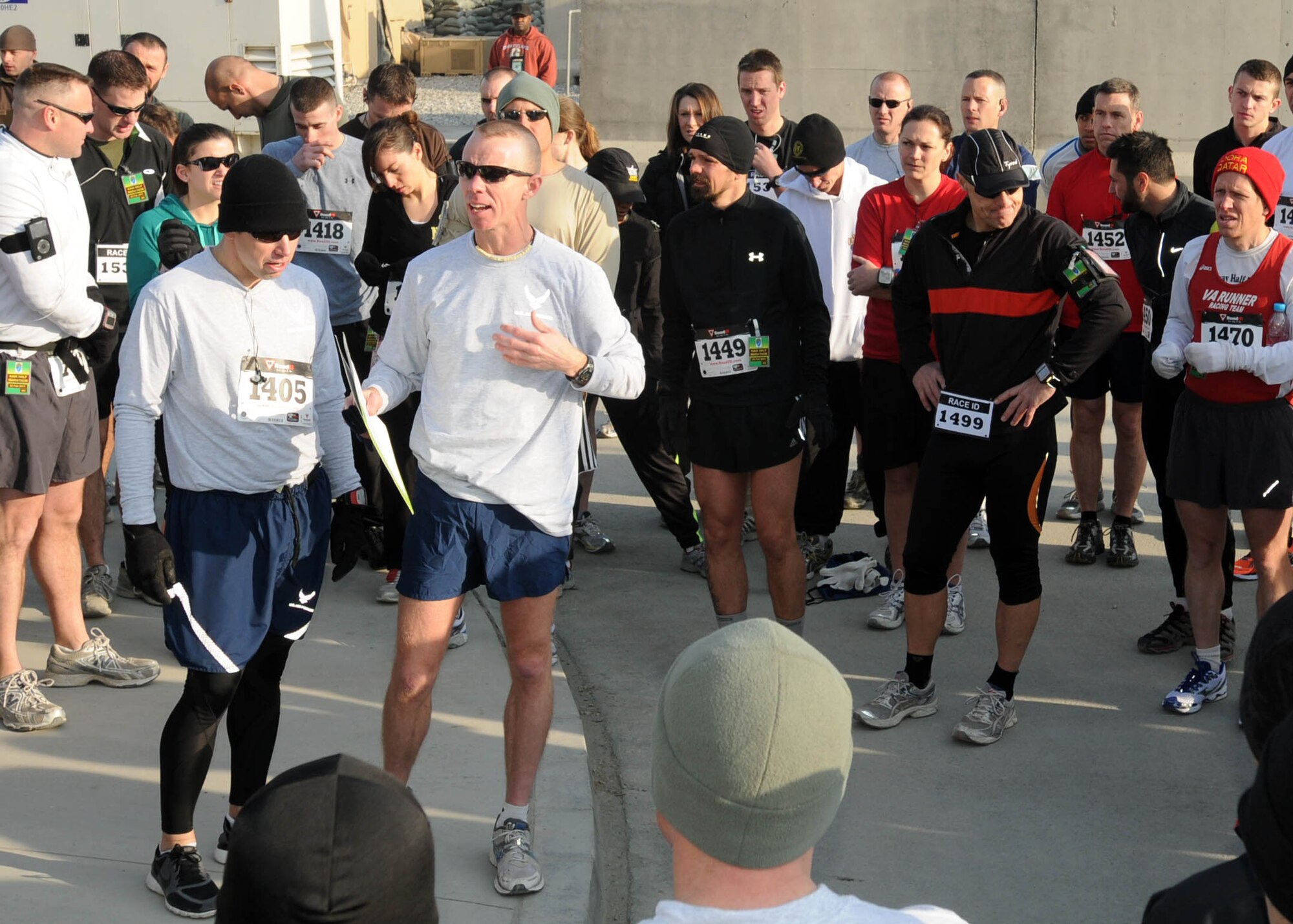 KABUL, Afghanistan - Members of the NATO Air Training Command - Afghanistan and ISAF Joint Command prepare to run the annual Fort Worth Cowtown race, one of the largest multi-event road races in the United States, at the Kabul International Airport, Afghanistan Feb 25. (U.S. Navy photo by Mass Communications Specialist 3rd Class Jared E. Walker).