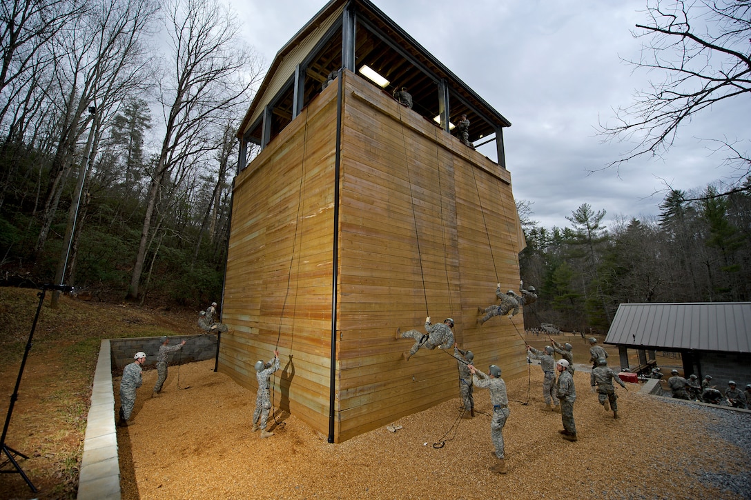 Army Rangers rappel down a 30-foot tower on Camp Frank D. Merrill, in Dahlonega, Ga., Feb. 20, 2011.