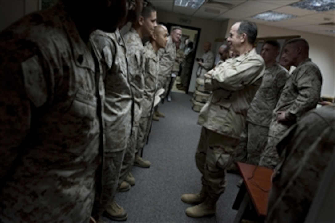 Chairman of the Joint Chiefs of Staff Adm. Mike Mullen, U.S. Navy, speaks with U.S. Marines assigned to U.S. Marine Corps Forces, Central Command in Bahrain on Feb. 25, 2011.  Mullen is on a weeklong trip through the Middle East to reassure friends and allies of the U.S. commitment to regional stability.  