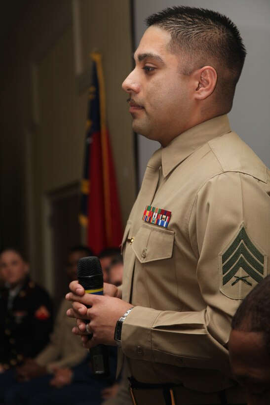 Sgt. Josue A. Jimenez addresses the audience as part of a panel discussing life in the modern military during a seminar hosted by the North Carolina Center for the Advancement of Teaching at the Sheraton Hotel in Atlantic Beach, N.C., Feb. 26. Jimenez, a communications/navigation/radar systems technician with Marine Electronic Warfare Squadron 1, was one of 11 service members on the panel.