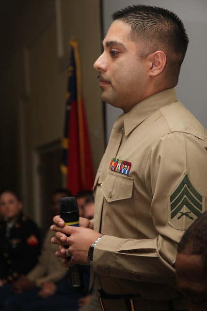 Sgt. Josue A. Jimenez addresses the audience as part of a panel discussing life in the modern military during a seminar hosted by the North Carolina Center for the Advancement of Teaching at the Sheraton Hotel in Atlantic Beach, N.C., Feb. 26. Jimenez, a communications/navigation/radar systems technician with Marine Electronic Warfare Squadron 1, was one of 11 service members on the panel.