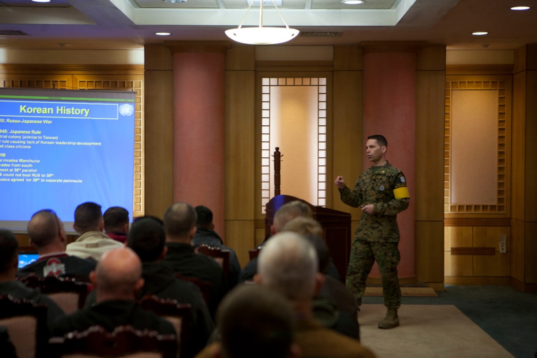 Maj. Sean Miller, the Assistant Secretary of Operations for the United Nations Command Military Armistice Commission briefs the 1st Marine Aircraft Wing senior leadership on the history of the Korean peninsula, the demilitarized zone and the Armistice Agreement here Feb. 26.