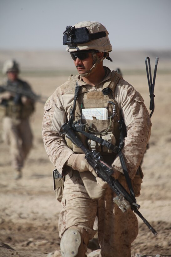 U.S. Marine Corps Sergeant Gabriel N. Soto, a squad leader with 1st Squad, 1st Platoon, Company L, Battalion Landing Team 3/8, 26th Marine Expeditionary Unit, Regimental Combat Team 8, leads his squad on a patrol near the village of Karim Kariz, Helmand province, Afghanistan, Feb. 27, 2011. Elements of the 26th Marine Expeditionary Unit deployed to Afghanistan to provide regional security in Helmand province in support of the International Security Assistance Force.