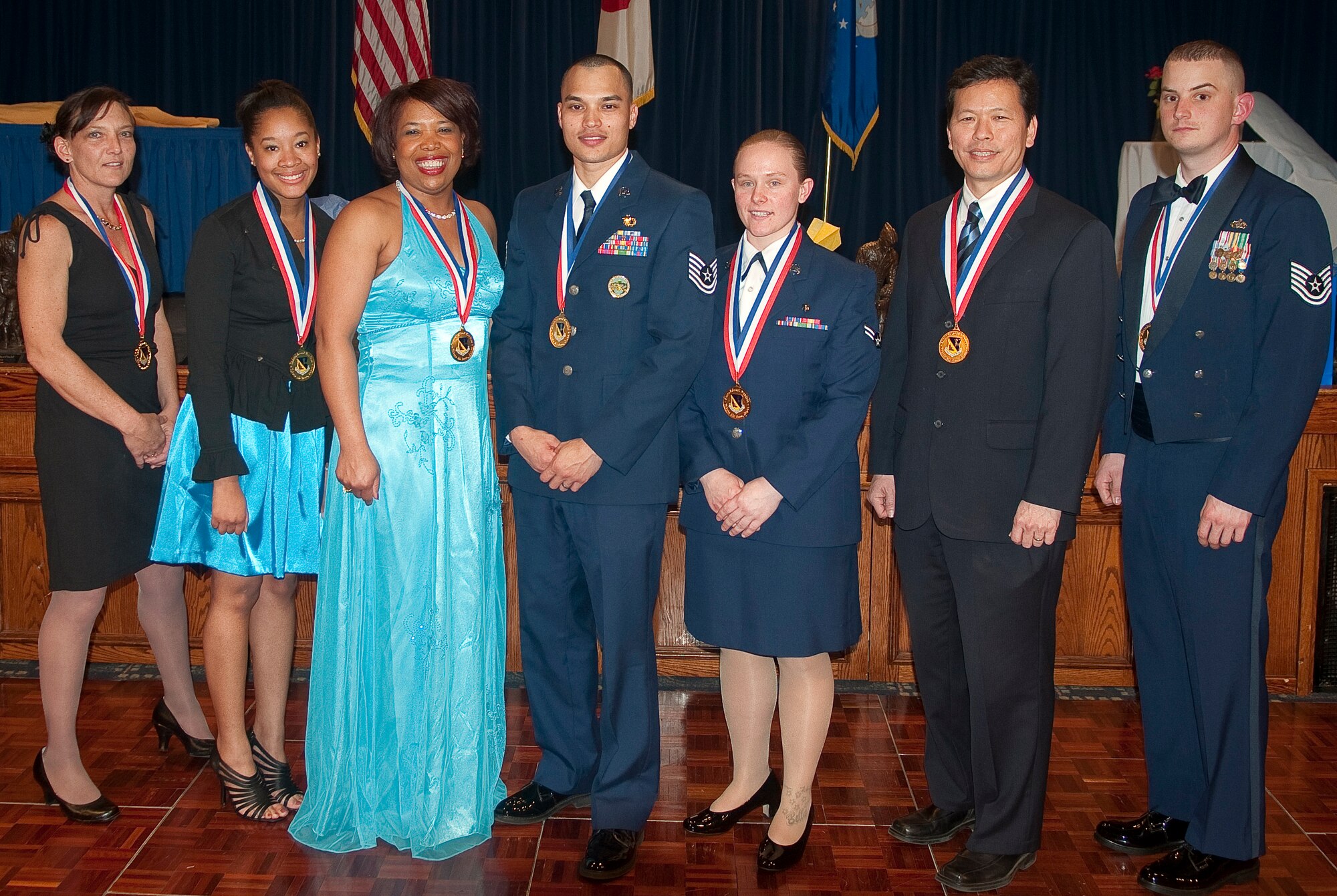 YOKOTA AIR BASE, Japan -- Award winners pose for a group photo during the 2010 Annual Awards Banquet held at the Enlisted Club here Feb. 26. (U.S.Air Force Photo/Staff Sgt. Chad C. Strohmeyer)