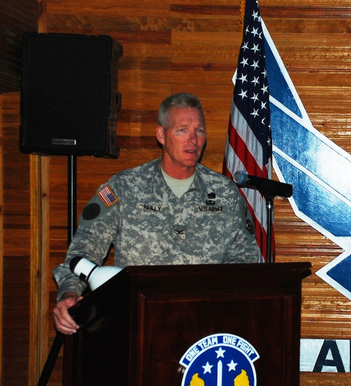 SOTO CANO AIR BASE, Honduras - Joint Task Force-Bravo commander Col. Greg Reilly addresses a capacity audience at the Black History Month celebration dinner, here, Feb. 25.  This year's theme focused on African-American individuals who made outstanding contributions during the American Civil War.  (Air Force photo/Captain John T. Stamm)