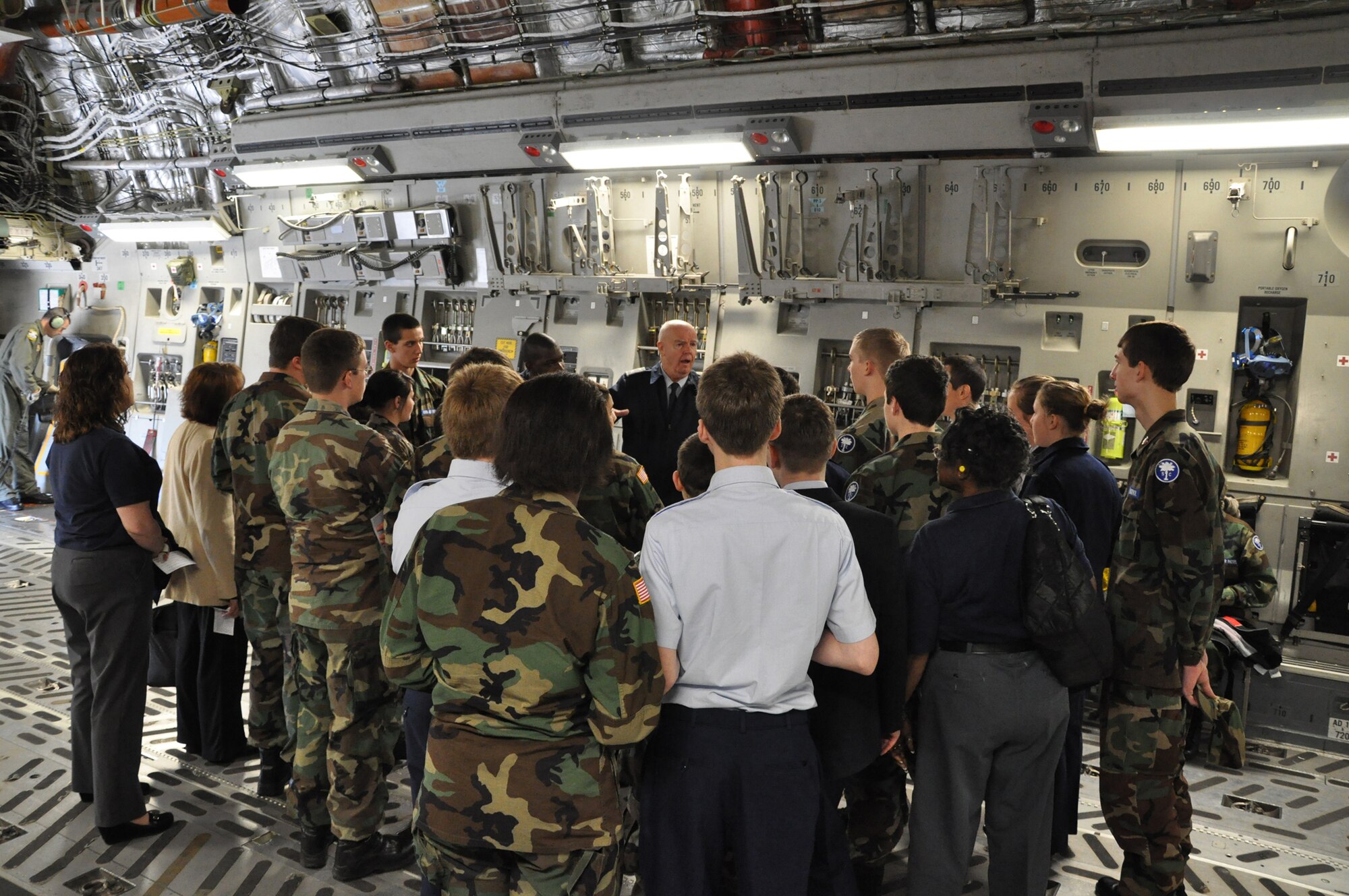 Col. Bob Townsend, a squadron commander with the South Carolina Civial Air Patrol, briefs cadets and leadership aboard a C17 Globemaster III aricraft at Joint Base Charleston, S.C. prior to takeoff for an orientation flight with the 315th Airlift Wing here Feb. 26, 2011. (U.S. Air Force Photo/Senior Airman Robert Pilch) 
