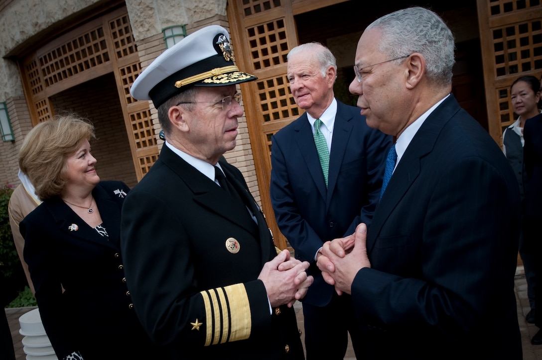 U.S. Ambassador to Kuwait, Deborah K. Jones, U.S. Navy Adm. Mike Mullen, chairman of the Joint Chiefs of Staff, former Secretaries of State James Baker and Gen. Colin Powell speak at the U.S. Embassy in Kuwait on Feb. 26, 2011. Mullen visited Kuwaiti to attend their National Day celebrations that marked the 50th anniversary of their independence, and the 20th anniversary of their ousting of Saddam Hussein's forces from their country during the first Gulf War.