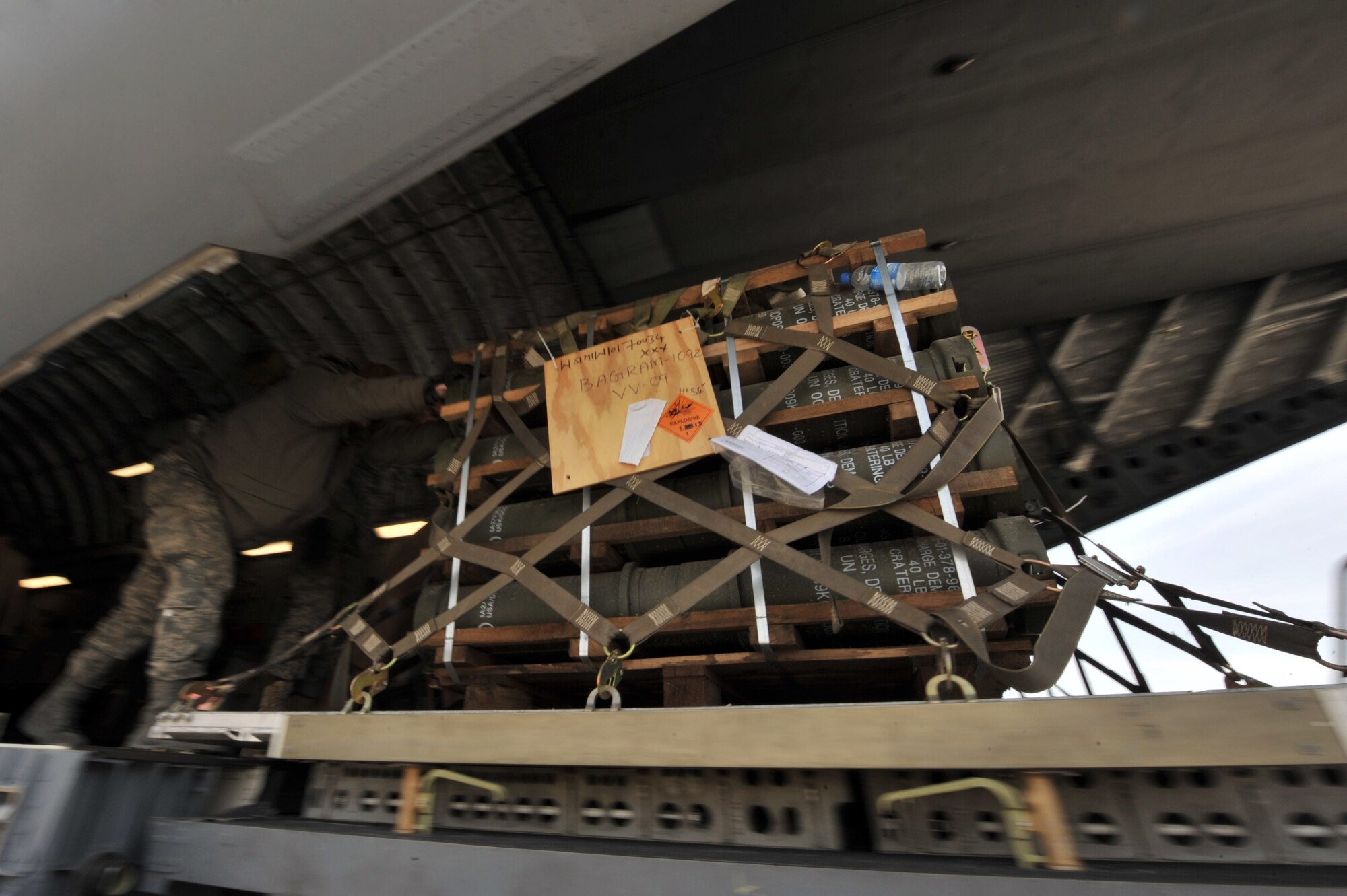 Members from the 455th Expeditionary Aerial Port Squadron unload cargo from a C-17 Globemaster III at Bagram Airfield, Afghanistan, Feb. 27, 2011.  The 455th EAPS was recently named the Air Combat Command’s winner of the 2011 Verne Orr Award. (Air Force photo by Senior Airman Sheila deVe