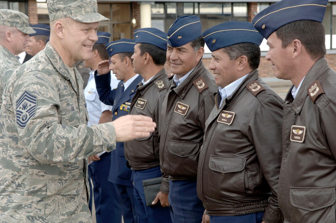 Chief Master Sgt. of the Air Force James A. Roy greets Colombian air force staff members Feb. 1, 2011, in Bogota. (U.S. Air Force photo/Tech. Sgt. Eric Petosky)