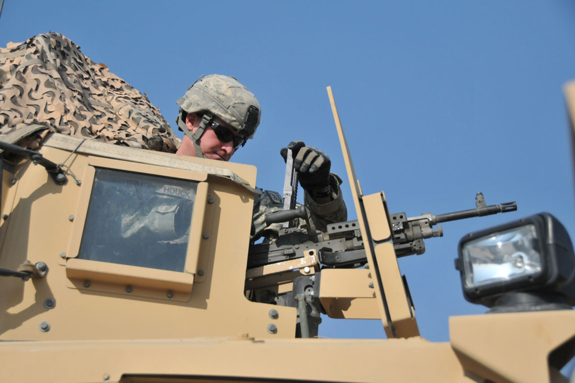 Spc. Michael Houck, a gunner with the 109th Transportation Company, checks the weapon on his turret as they conduct inspection on their vehicle. Houck’s company is part of the 17th Combat Sustainment Support Battalion, 101st Sustainment Brigade, and has logged more than 600,000 miles in Afghanistan. (U.S. Army photo/Sgt. 1st Class Pete Mayes)