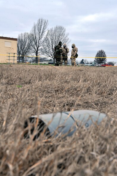 Members of a Post Attack Reconnaissance team cordon off a simulated unexploded ordnance during the Ability to Survive and Operate Rodeo during the Conventional Operation Readiness Exercise at the Warrior Center on Barksdale Air Force Base, La., Feb. 25. The ATSO Rodeo required Airmen to think on their feet and use skills and training they received. (U.S. Air Force photo/Airman 1st Class Micaiah Anthony)( RELEASED)
