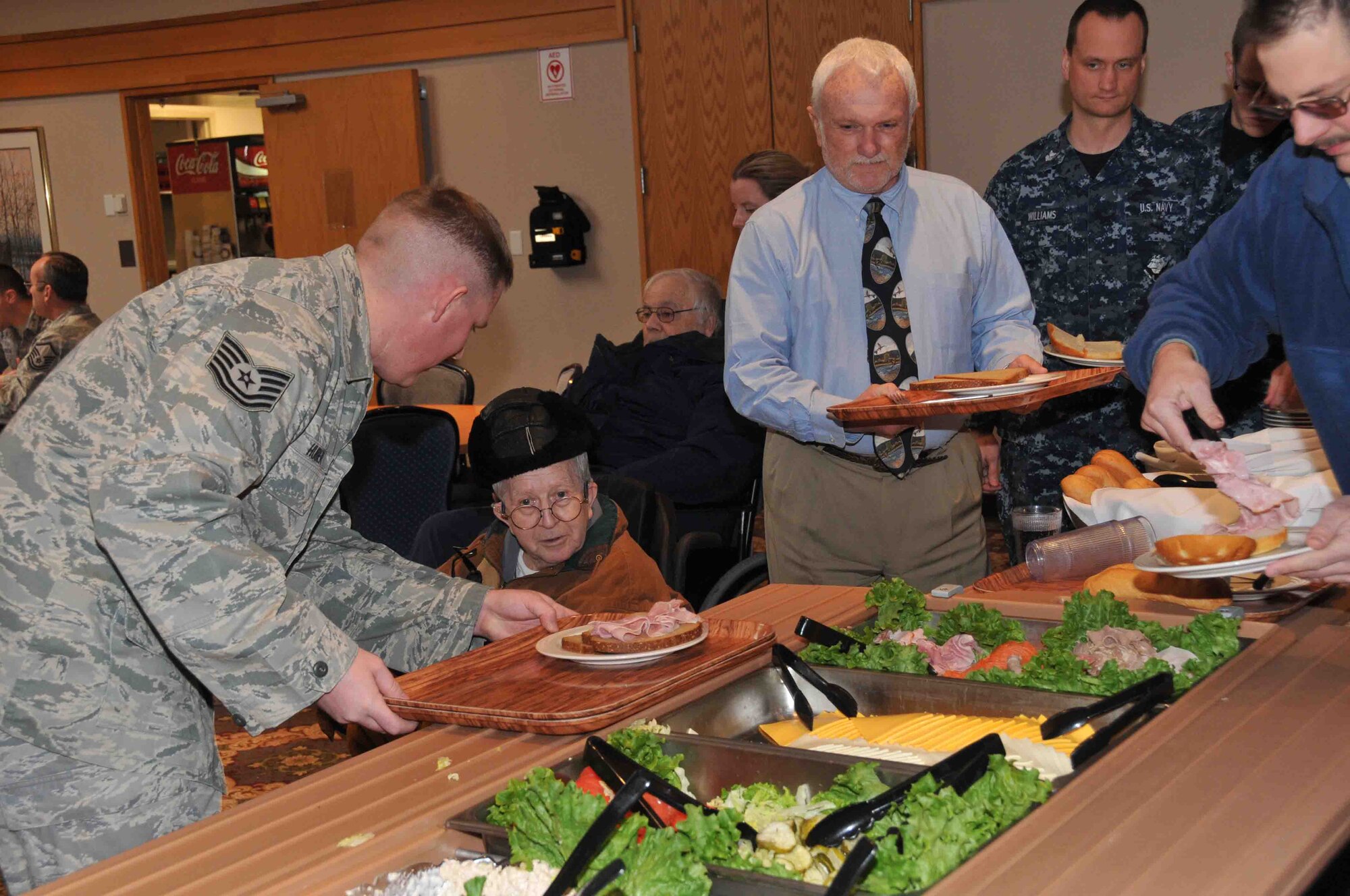 934th Airlift Wing members share lunch and memories during "Take a Vet to Lunch Day" at the 934th Airlift Wing Services Club Feb. 24. (Photo by Paul Zadach)