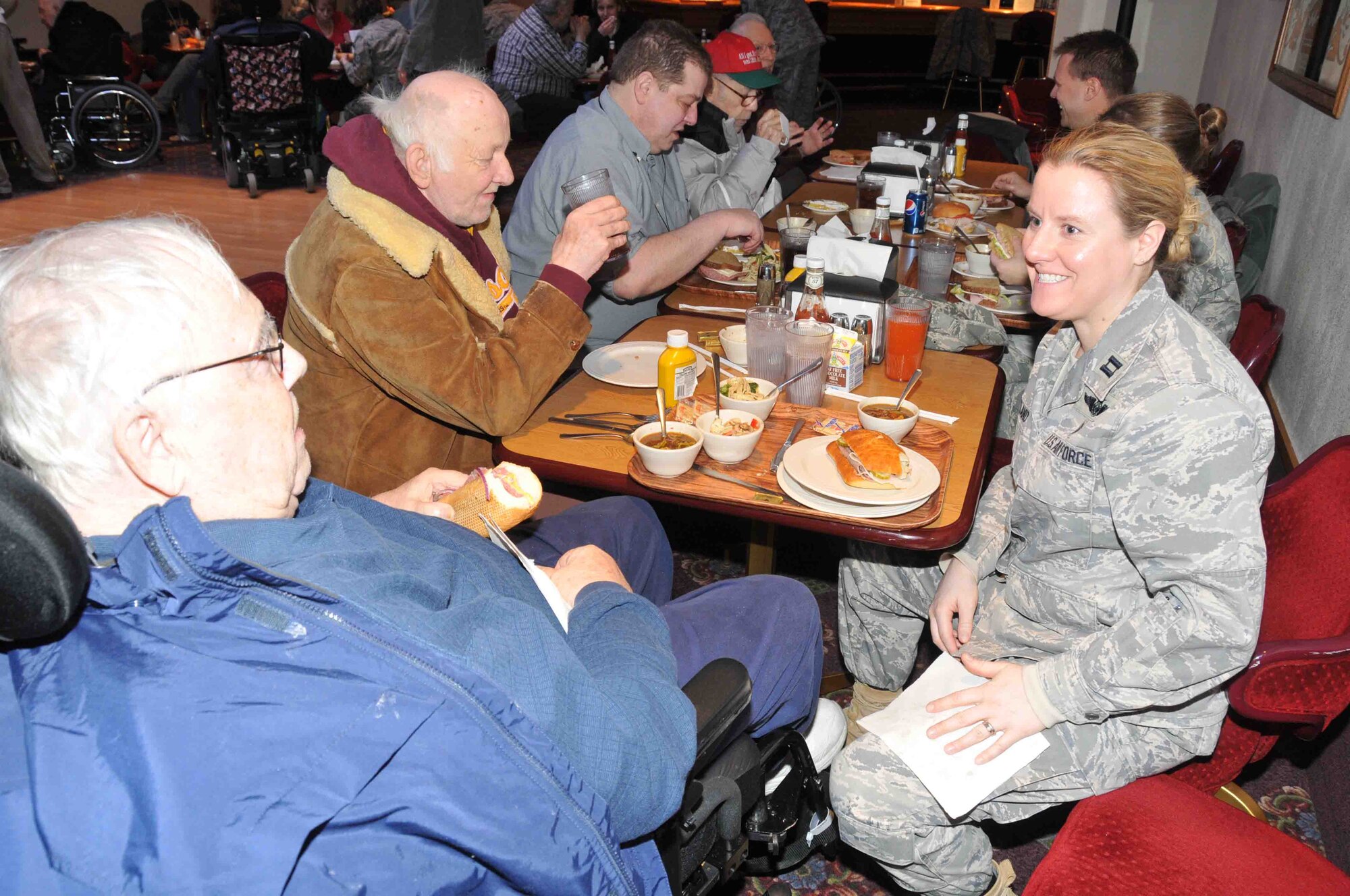 934th Airlift Wing members share lunch and memories during "Take a Vet to Lunch Day" at the 934th Airlift Wing Services Club Feb. 24. (Photo by Paul Zadach)