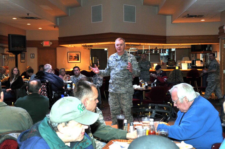 Col. Ron Wilt, 934th Operations Group commander, talks to veterans at "Take a Vet to Lunch Day" at the 934th Airlift Wing Services Club Feb. 24. (Photo by Paul Zadach)