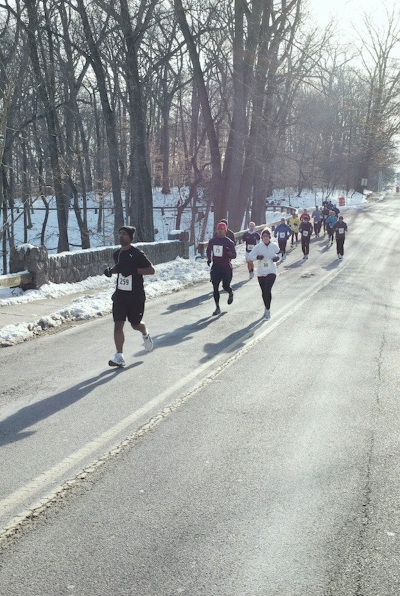 Airman 1st Class Raymond Soto, leads the pack during the 35th PSCI Icicle 10-miler in Wilmington, Jan. 31, 2011. Airman Soto placed first for his age group. He has lost 25 pounds during his deployment to Air Force Mortuary Affairs Operations. (Courtesy photo)
