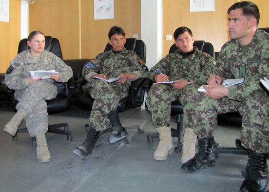 KABUL, Afghanistan - 1st Lt. Alexandria Mann gives Afghan Air Force lieutenants training about famous woman in U.S. history at the Afghan Air Force English immersion lab known as the “Thunder Lab” at Kabul, Afghanistan, Feb. 27.