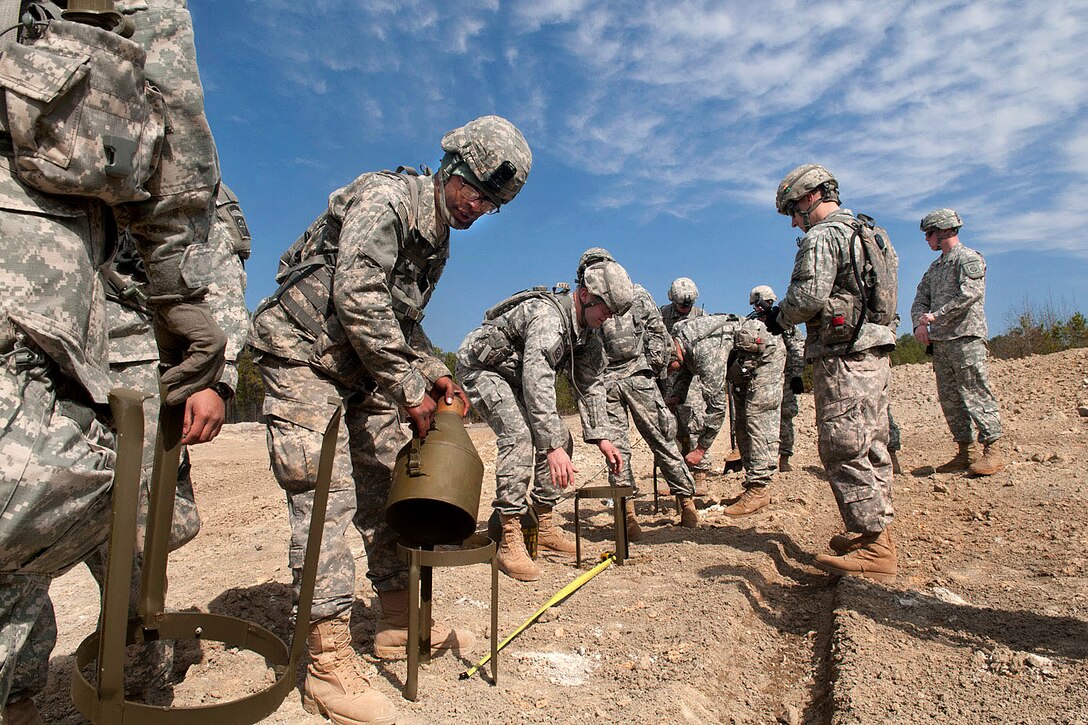 Army Combat Engineers Prepare Explosive Charges For Detonation On Fort 